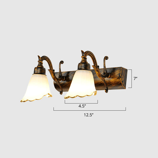 Bronze Wall Lamp With Country Flower Shade And White Rid Glass For Vanity Lighting