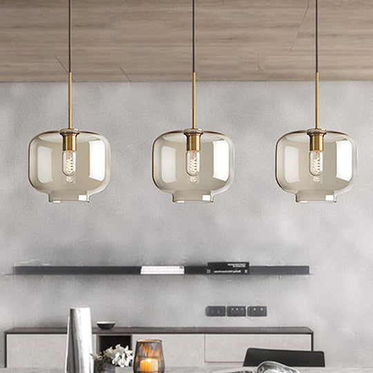 Contemporary Brass Pendant Light With Clear Glass Shade - Oval/Drum/Cylinder 1-Light 7/10/11 Wide