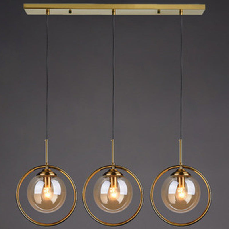 Mid-Century Globe Hanging Lamp With Glass Shade & Metal Ring - Perfect For Bedrooms Amber / Linear