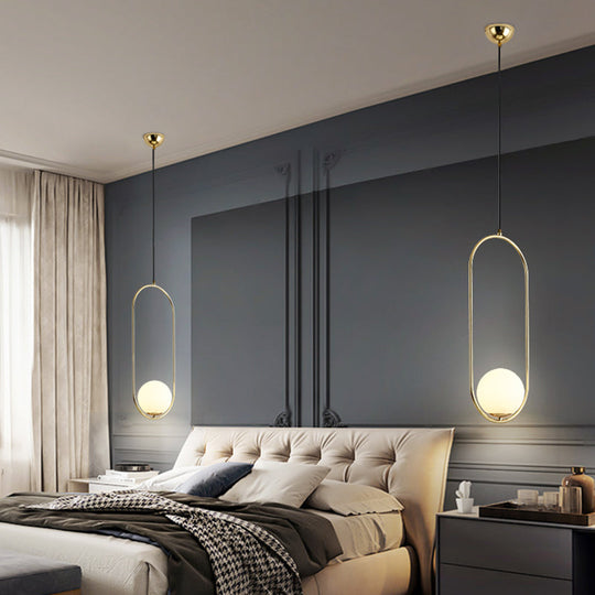 White Glass Pendant Light With Mid-Century Globe Design And Metal Ring