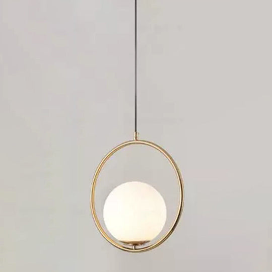 White Glass Pendant Light With Mid-Century Globe Design And Metal Ring