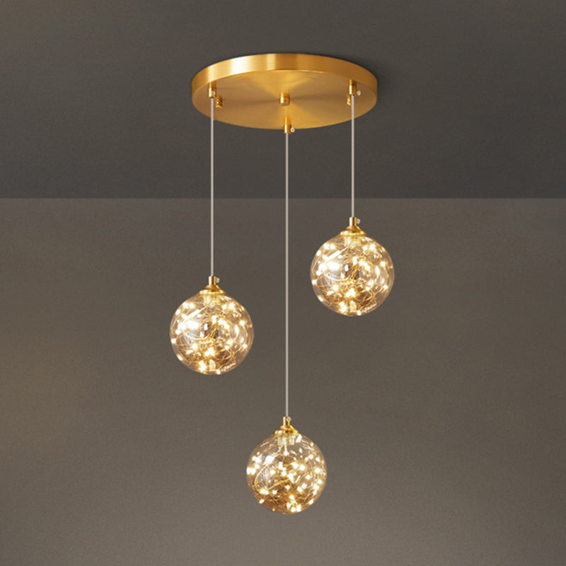 Amber Glass Led Pendant Lamp With Brass Finish - Nordic Style Lighting For Bedroom