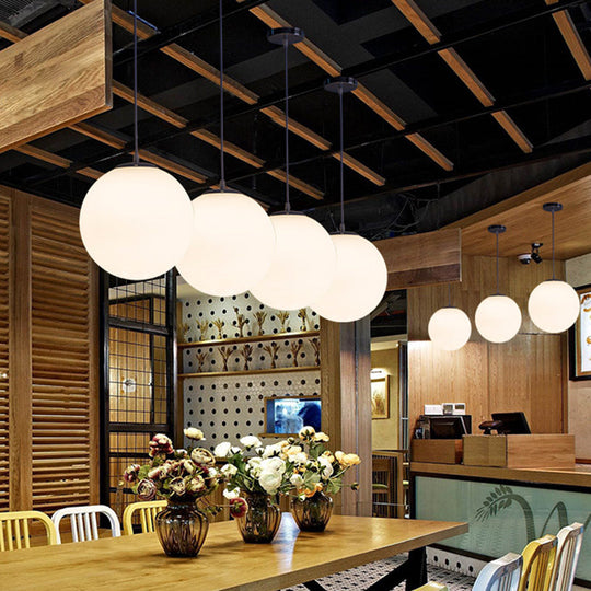 Modern Glass Pendant Lighting Fixture - White Hanging Light For Globe Clothes Shop