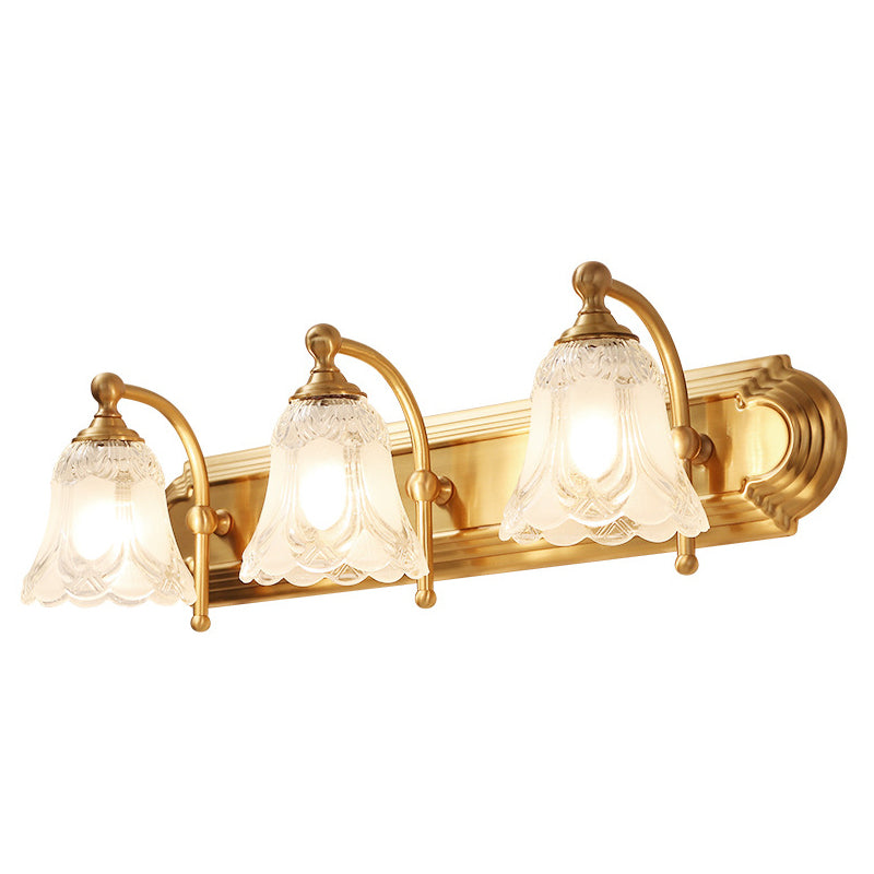 Brass Armed Wall Sconce With Ribbed Glass Shade For Bathroom Decoration
