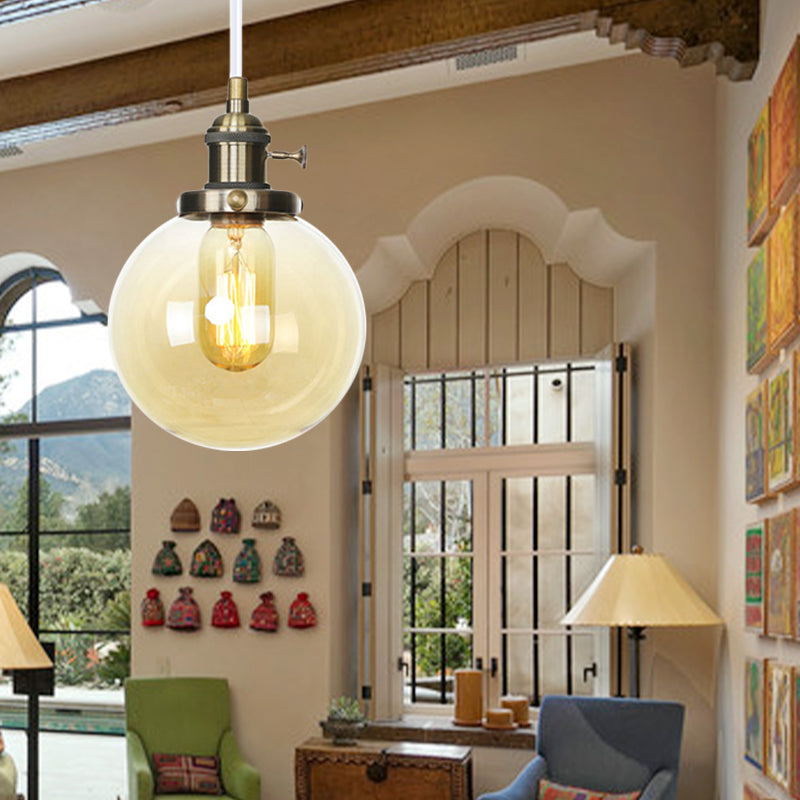 Farmhouse Orbit Pendant Light With Amber/Clear Glass And Adjustable Cord In 3 Elegant Finish Options