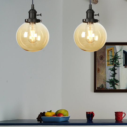 Farmhouse Orbit Pendant Light With Amber/Clear Glass And Adjustable Cord In 3 Elegant Finish Options