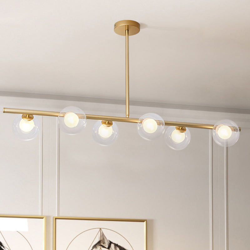 Nordic Metal 6-Head Linear Island Light With Gold Finish And Clear Glass Globes
