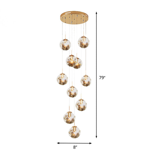 Contemporary Gold Ball Chandelier With Amber Dimpled Glass Pendant - 10 Bulbs Multi-Light For