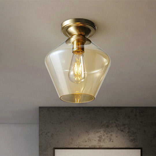 Contemporary Brass Flush Ceiling Fixture With Amber Glass Lampshade