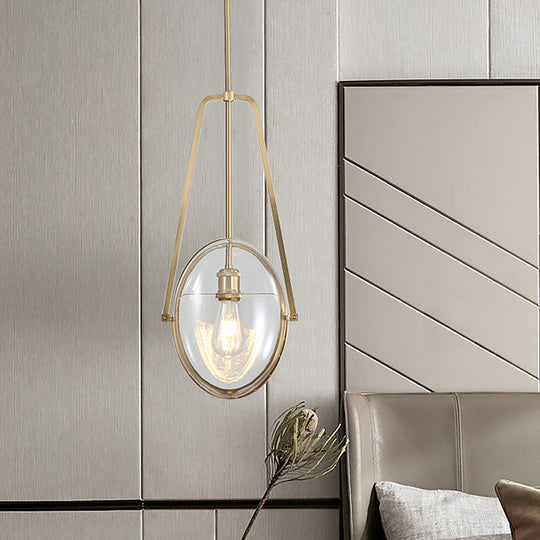 Contemporary Brass Oval Pendant Light With Clear Glass And Halberd Frame - 1-Light Ceiling Lamp