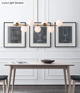 7-Light Modern Gold Metal Island Pendant With Spherical White Glass - Ideal For Dining Table