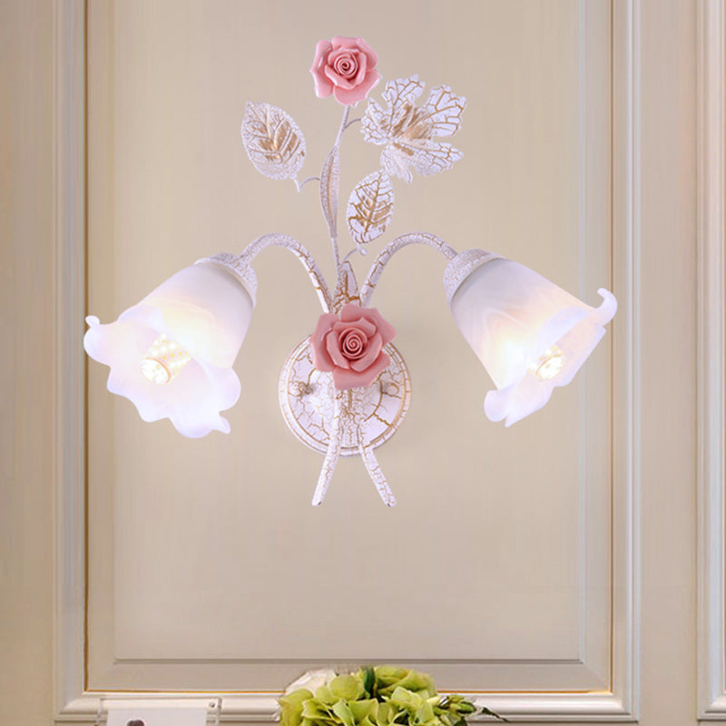 Pastoral Floral White Glass Wall Sconce With Metal Curved Arm For Living Room - 1/2-Light Mount Lamp