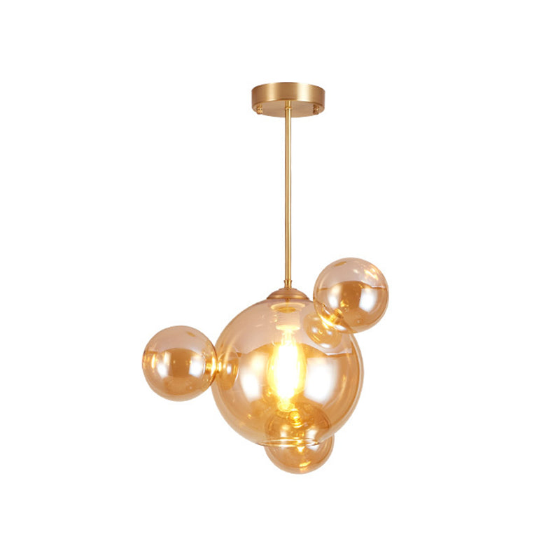 Modernist Amber Glass Pendant Lamp For Dining Table - 1 Light Bubble Shape Hanging Kit
