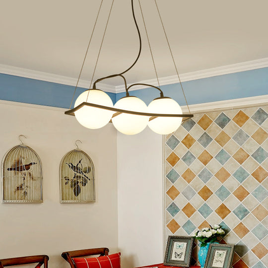 Modernist Frosted Glass Pendant Light With Globe Design - 3/4 Lights Black Frame For Ceiling Hang 3