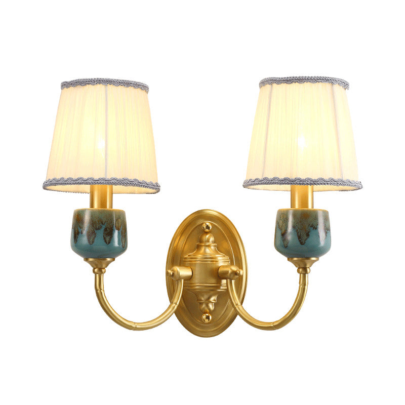 Brass Wall Hanging Light With Classic Swooping Arm And Fabric Shade