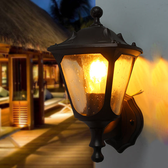 Rural Style Outdoor Lantern Wall Sconce With Clear Bubble Glass - 1-Head Black Surface