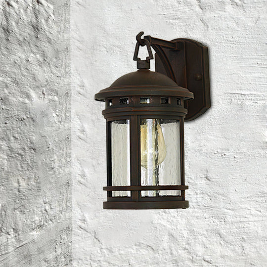 Rustic Outdoor Wall Lantern Sconce With Clear Seeded Glass Metal Frame In Coffee/Black - 1 Light