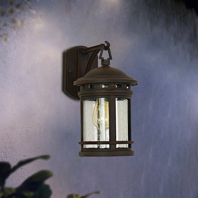 Rustic Outdoor Wall Lantern Sconce With Clear Seeded Glass Metal Frame In Coffee/Black - 1 Light