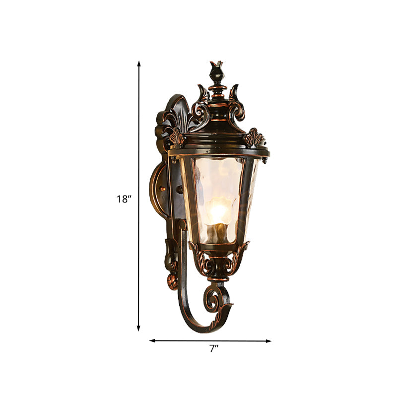 Clear Water Glass Outdoor Wall Sconce: Scrolled Arm 1-Light Black & Gold Lodge Lighting