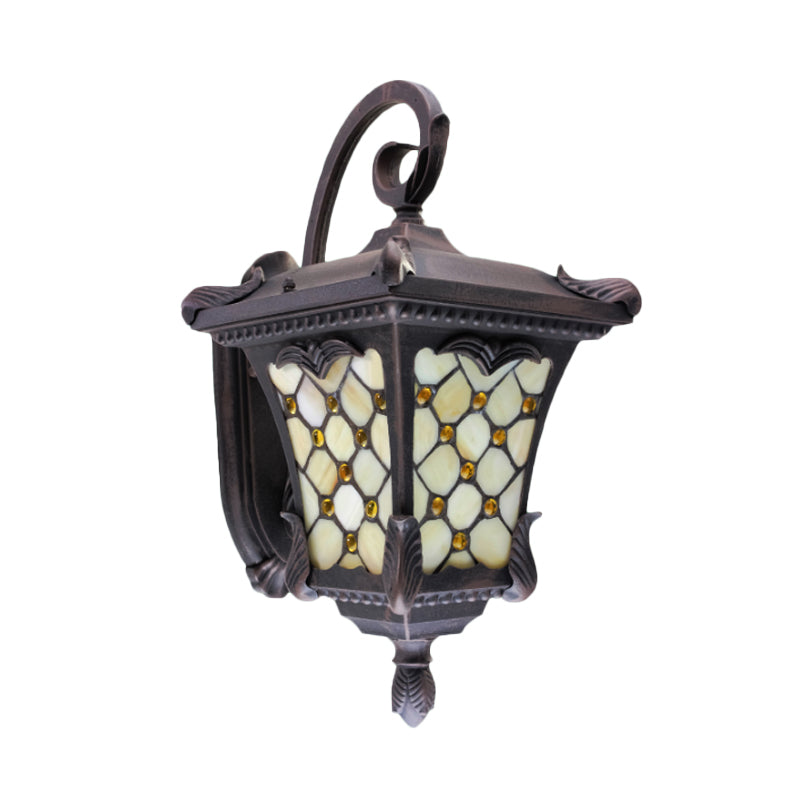 Rustic Black Wall Sconce With Scrolled Arm And Frosted Glass For Outdoor Use