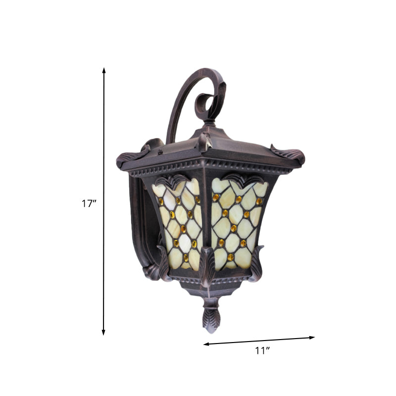 Rustic Black Wall Sconce With Scrolled Arm And Frosted Glass For Outdoor Use
