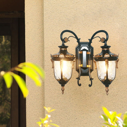 Countryside Black/Gold-Copper Urn Wall Sconce Light With Clear Glass - 2 Bulbs Black-Gold