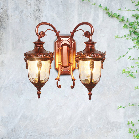 Countryside Black/Gold-Copper Urn Wall Sconce Light With Clear Glass - 2 Bulbs
