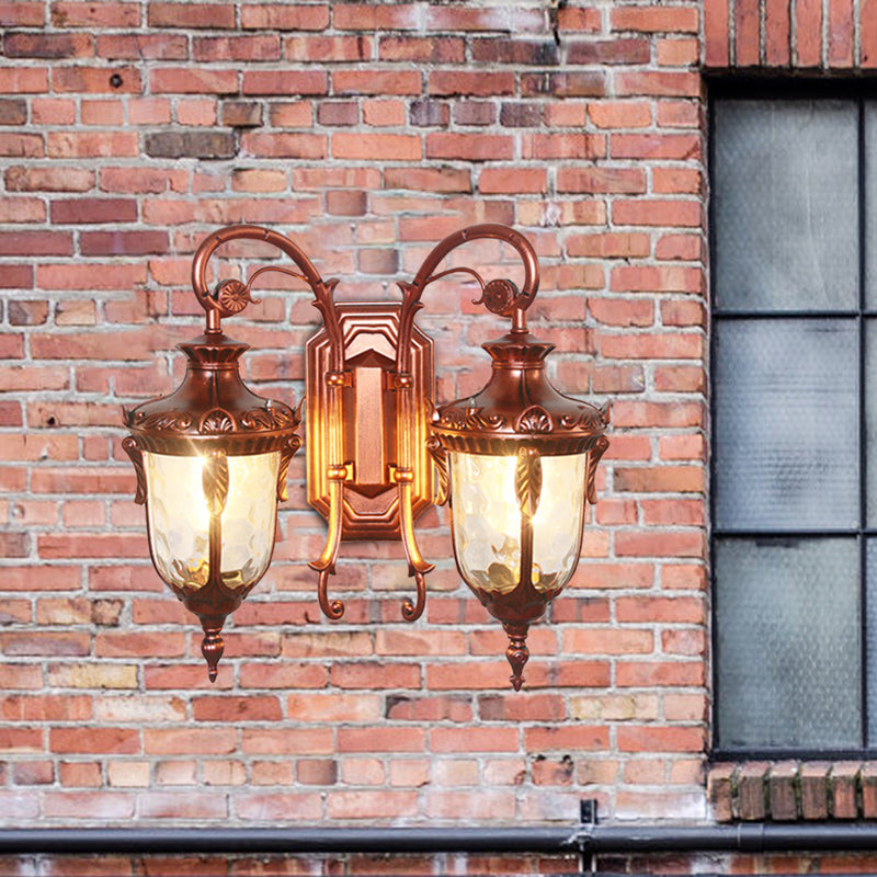 Countryside Black/Gold-Copper Urn Wall Sconce Light With Clear Glass - 2 Bulbs