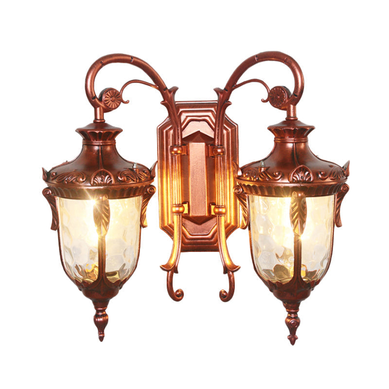 Countryside Black/Gold-Copper Urn Wall Sconce Light With Clear Glass - 2 Bulbs