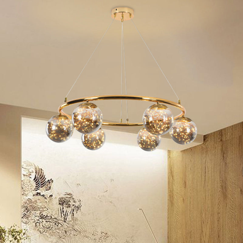 Modernist Smoke Gray Glass Ball Chandelier - 6 Head Brass Ring Pendant Light With Unique Glowworm