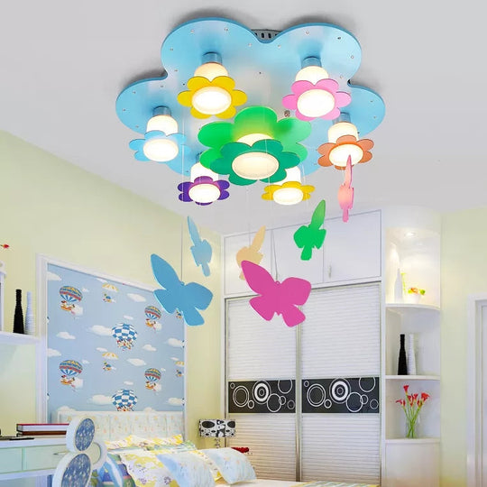 Blue Blossom Ceiling Mount Light With Hanging Butterfly: 7-Head Wood Lamp For Child Bedroom