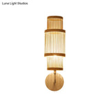 Asian Style Bamboo Wall Lamp Cylinder Fixture Single Bulb Wood Lighting With Curved Arm Ideal For