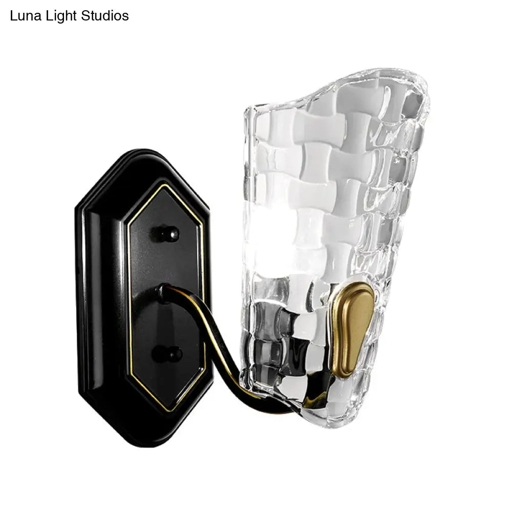 Black Modernist Wall Sconce With Curved Metal Arm And Clear Crystal Panel