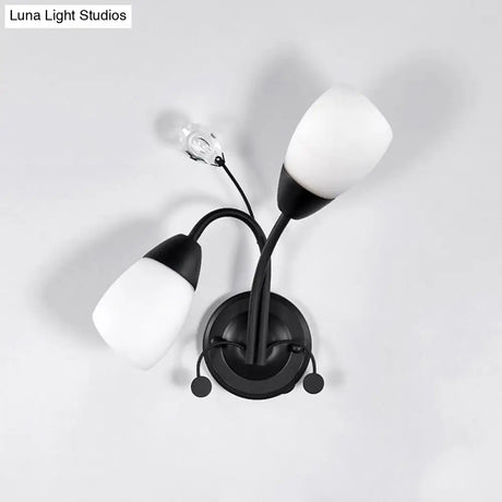 Black Tulip Wall Sconce With Ivory Glass And Crystal Accent