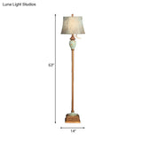 Blue Rustic Fabric Standing Lamp With Curved Vines Patterned Shade