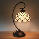 Bronze Tiffany Night Table Lamp With Beaded Patterned Shade - Swirl Arm Beige/White Glass Green