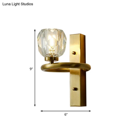 Contemporary Brass Wall Sconce With Global Crystal Shade - Elegant Dining Room Lighting