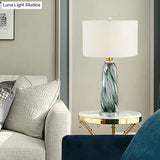 Contemporary Fabric Cylindrical Task Light - White Nightstand Lamp With Pewter Glazed Crystal Base