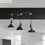 Industrial 3-Light Pendant With Adjustable Shades And Pulley Design In Black