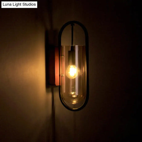 Industrial Black Cylinder Sconce Lighting - Clear/Amber Glass Wall Mount Fixture