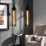 Industrial Black Iron Cage Pendant Light - 1-Bulb Cylindrical Ceiling Fixture For Bars