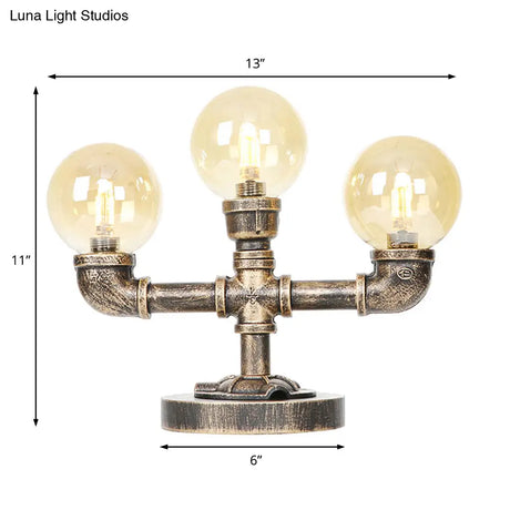 Industrial Task Lighting - Clear/Amber Glass Desk Lamp With Antique Bronze Base