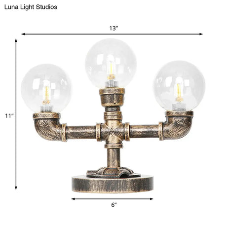 Industrial Task Lighting - Clear/Amber Glass Desk Lamp With Antique Bronze Base