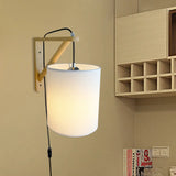 Japanese Style Cylindrical Fabric Wall Sconce With 1-Bulb And Wood Mount White