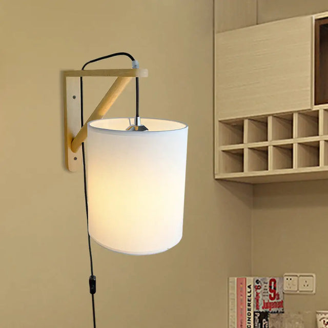 Japanese Style Cylindrical Fabric Wall Sconce With 1-Bulb And Wood Mount White