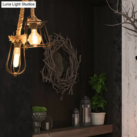 Lodge Style Black Caged Ceiling Fixture With Metal And Rope Hangings - 2 Lights Unique Shade For
