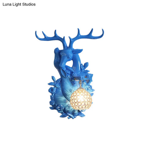 Loft Style Wall Mounted Sconce With Clear Crystal Shade Blue/Gold Finish And Deer Head Accent