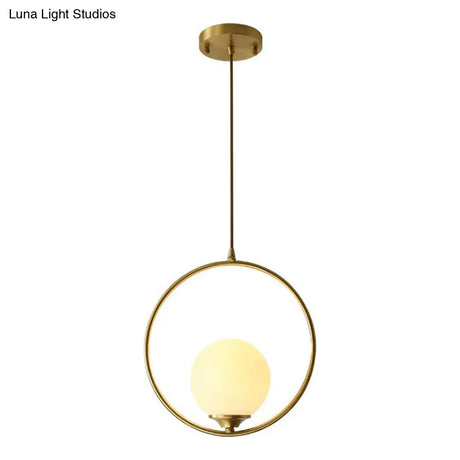 Minimalist Antique Gold Ball Ceiling Lamp With Cream Glass Shade And Ring Decoration