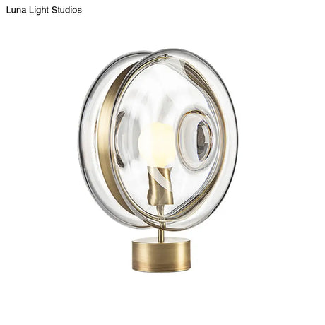 Minimalist Gold Metal Round Nightstand Lamp With Clear Glass Shade