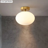 Minimalist Gold Oval Semi Flush Ceiling Light - 1 - Light Cream Glass Lamp For Bedroom